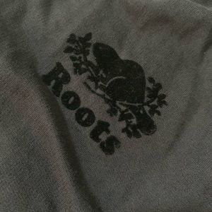 black roots zip up sweater